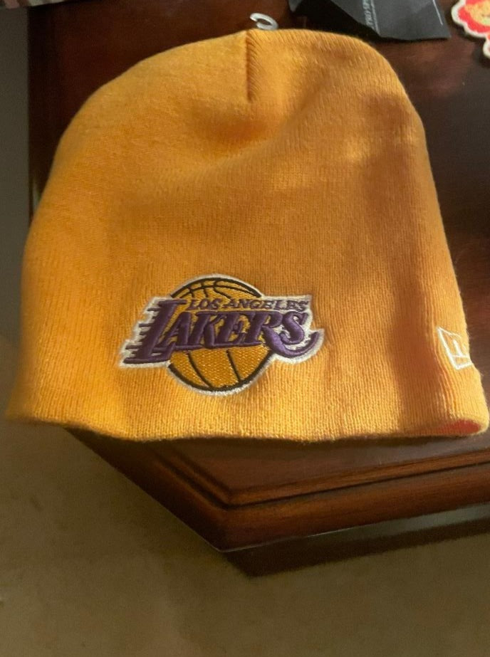 Los Angeles Lakers Yellow New Era Cuffless Knit Skull Cap Beanie Hat